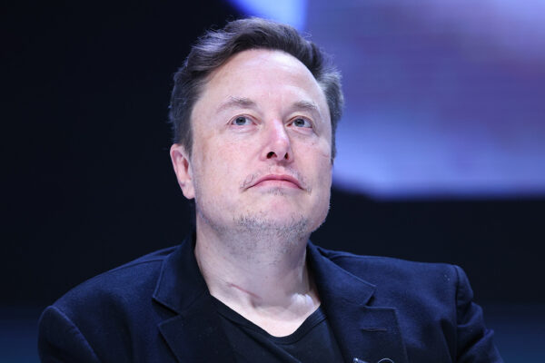 Elon Musk celebrates as Tesla completes first self-driving delivery to customer